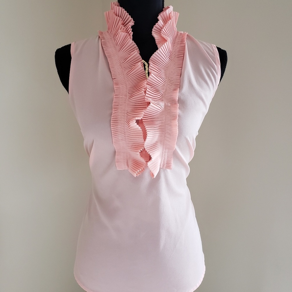 Coral sleeveless blouse with ruffles